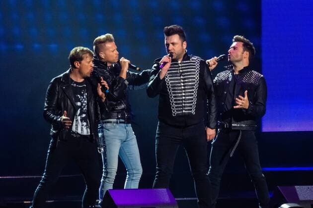 BEIJING, CHINA - AUGUST 13: Irish singer songwriter Shane Filan, Irish singer songwriter Markus Feehily (aka Mark Feehily), Irish singer multi-instrumentalist songwriter Kian Egan and Irish singer songwriter Nicky Byrne of Irish pop vocal group Westlife perform during their concert The Twenty Tour at Cadillac Arena on August 13, 2019 in Beijing, China.  Copyright: xVCGx CFP111231137685