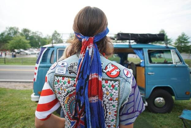 Attendees dressed in 60 s clothing tour the grounds at the 50th anniversary of the Woodstock Music Festival at Bethel Woods Center For The Arts on Friday, August 16, 2019 in Bethel, New York. Woodstock was a music festival held August 15Ð18, 1969, which attracted an audience of more than 400,000 and is widely regarded as a pivotal moment in popular music history.  NYP20190816129 JOHNxANGELILLO