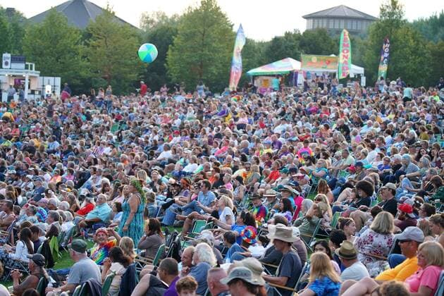 Fans react as they watch the performances at the 50th anniversary of the Woodstock Music Festival at Bethel Woods Center For The Arts on Friday, August 16, 2019 in Bethel, New York. Woodstock was a music festival held August 15Ð18, 1969, which attracted an audience of more than 400,000 and is widely regarded as a pivotal moment in popular music history.  NYP20190816167 JOHNxANGELILLO
