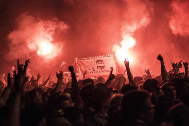 the german punkrock band Feine Sahne Fischfilet Vocals Jan Monchi Gorkow E Guitar, Vocals Christoph Sell Trumpet Jacobus North Trumpet Max Bobzin E Bass Kai Irrgang Drums Olaf Ney at the Highfield Festival 2019 at the Störmthaler See south of Leipzig numerous pyros were ignited during the show