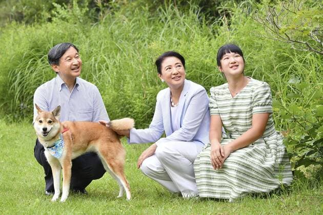 Japan imperial family on summer vacation (From L) Japanese Emperor Naruhito, Empress Masako and their daughter Princess Aiko are pictured as they take a stroll with their dog Yuri at Nasu Imperial Villa in Tochigi Prefecture, eastern Japan, on Aug. 19, 2019. (Pool photo) 