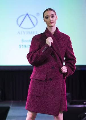 (190820) -- TORONTO, Aug. 20, 2019 -- A model presents a creation during the fashion show of the 2019 Apparel Textile Sourcing Canada trade show in Toronto, Canada, on Aug. 20, 2019. The fashion show displayed the latest designs from dozens of fashion brands around the world on Tuesday. (Photo by Xinhua) CANADA-TORONTO-APPAREL TEXTILE SOURCING TRADE SHOW-FASHION ZouxZheng 