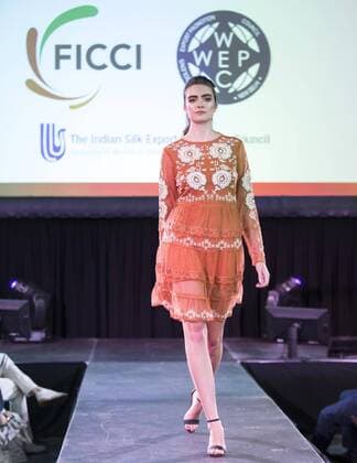 (190820) -- TORONTO, Aug. 20, 2019 -- A model presents a creation during the fashion show of the 2019 Apparel Textile Sourcing Canada trade show in Toronto, Canada, on Aug. 20, 2019. The fashion show displayed the latest designs from dozens of fashion brands around the world on Tuesday. (Photo by Xinhua) CANADA-TORONTO-APPAREL TEXTILE SOURCING TRADE SHOW-FASHION ZouxZheng 