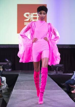 (190820) -- TORONTO, Aug. 20, 2019 -- A model presents a creation during the fashion show of the 2019 Apparel Textile Sourcing Canada trade show in Toronto, Canada, on Aug. 20, 2019. The fashion show displayed the latest designs from dozens of fashion brands around the world on Tuesday. (Photo by Xinhua) CANADA-TORONTO-APPAREL TEXTILE SOURCING TRADE SHOW-FASHION ZouxZheng 