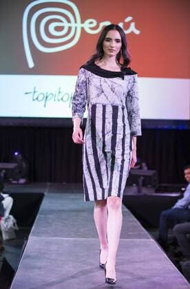 (190820) -- TORONTO, Aug. 20, 2019 -- A model presents a creation during the fashion show of the 2019 Apparel Textile Sourcing Canada trade show in Toronto, Canada, on Aug. 20, 2019. The fashion show displayed the latest designs from dozens of fashion brands around the world on Tuesday. (Photo by Xinhua) CANADA-TORONTO-APPAREL TEXTILE SOURCING TRADE SHOW-FASHION ZouxZheng 