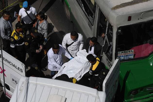 August 20, 2019 EUM20190820ACT02 JPG MEXICO CITY SecuritySecurity CDMX Elements of the Secretaria de Seguridad Ciudadana SSC and experts from the Procuraduria General de Justicia PGJ assist in the uprising of the body of a custodian of the Reclusorio Oriente who was shot this Tuesday afternoon, August 20, 2019 inside a public transportation unit in the mayors office Iztapalapa Phot  - ZUMAu78_ 20190820_zaf_u78_023 Copyright: xElxUniversalx