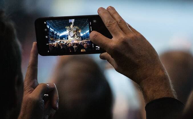 August 20, 2019 - Udvar-Hazy Center, Virginia, USA - A member of the audience takes a picture with their phone as Vice President Mike Pence is introduced during the sixth meeting of the National Space Council at the Smithsonian National Air and Space Museum s Steven F. Udvar-Hazy Center in Chantilly, Va. Chaired by the Vice President, the council s role is to advise the President regarding national space policy and strategy, and review the nation s long-range goals for space activities. Udvar-Hazy Center USA - ZUMAz03_ 20190820_sha_z03_112 Copyright: xJoelxKowsky NASAx