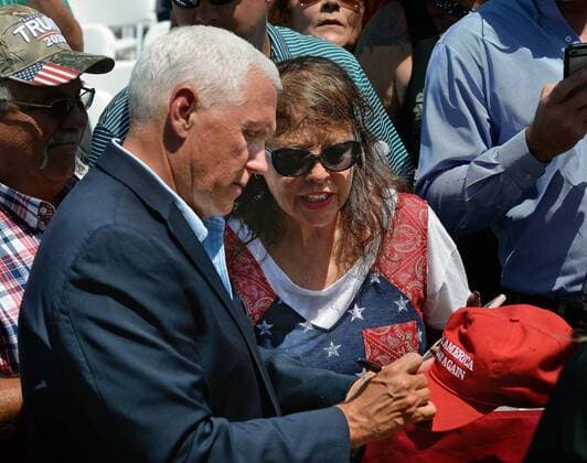 August 21, 2019, Artesia, NM, USA: Lila Mayes of Albuquerque gets her MAGA hat autographed by Vice President Mike Pence at Elite Well Services in Artesia, NM. Wednesday, Aug. 21, 2019. Artesia USA - ZUMAab1_ 20190821_zaf_ab1_016 Copyright: xJimxThompsonx