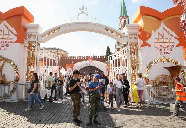 MOSCOW, RUSSIA - AUGUST 23, 2019: People during the Spasskaya Tower Festival of Children s Wind Bands at the Children Playground in Red Square as part of the 12th Spasskaya Tower International Military Music Festival. Mikhail Tereshchenko TASS  TS0B77C6