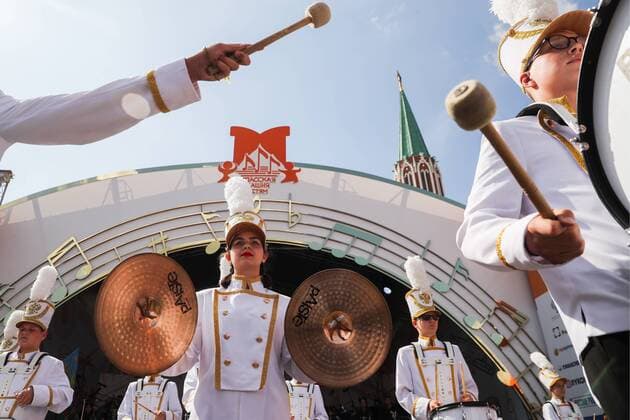 MOSCOW, RUSSIA - AUGUST 23, 2019: Participants in the Spasskaya Tower Festival of Children s Wind Bands perform at the Children Playground in Red Square as part of the 12th Spasskaya Tower International Military Music Festival. Mikhail Tereshchenko TASS  TS0B77DB