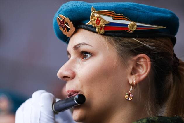 MOSCOW, RUSSIA - AUGUST 23, 2019: A young girl takes part in the Spasskaya Tower Festival of Children s Wind Bands at the Children Playground in Red Square as part of the 12th Spasskaya Tower International Military Music Festival. Mikhail Tereshchenko TASS  TS0B77DF
