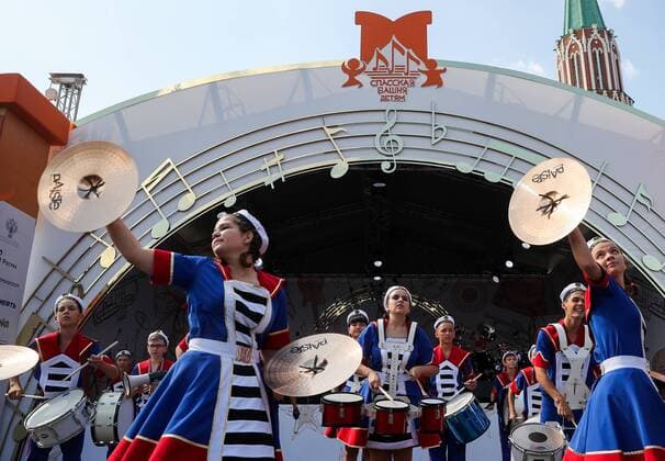 MOSCOW, RUSSIA - AUGUST 23, 2019: Participants in the Spasskaya Tower Festival of Children s Wind Bands perform at the Children Playground in Red Square as part of the 12th Spasskaya Tower International Military Music Festival. Mikhail Tereshchenko TASS  TS0B77E5