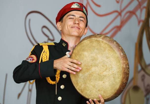 MOSCOW, RUSSIA - AUGUST 23, 2019: A participant in the Spasskaya Tower Festival of Children s Wind Bands performs at the Children Playground in Red Square as part of the 12th Spasskaya Tower International Military Music Festival. Mikhail Tereshchenko TASS  TS0B77E6