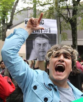 A group of people participate in a demonstration to call attention to the fires of the Amazon jungle and in rejection of the situation management by the Government of the president of Brazil, Jair Bolsonaro, in front of the Brazilian Embassy in Mexico City, Mexico, 23 August 2019. The fires, the most serious of recent years, round up the anti-environmentalist discourse of Bolsonaro, who since his election campaign made clear his lack of interest in issues related to the environment and conservation. The intensification of the fires caused by the severe drought, the high temperatures and the advance of deforestation in the Brazilian Amazon aroused a mass reaction from the international community, which criticizes Bolsonaro s speech and the Government s lack of reaction to face the natural disaster. Protest in Santiago for the fires that  Copyright: xMarioxGuzmanx AME9733 20190824-637022088736697958