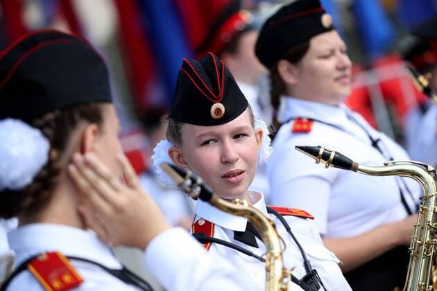 MOSCOW, RUSSIA - AUGUST 24, 2019: Massed band musicians of Moscow s secondary school No 1770 perform on the Poklonnaya Hill at the festival of children s wind bands as part of the 2019 Spasskaya Tower International Military Music Festival. Mikhail Tereshchenko TASS  TS0B7A12