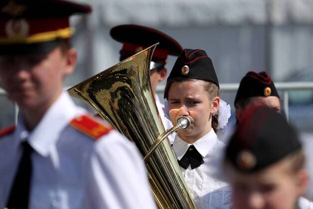 MOSCOW, RUSSIA - AUGUST 24, 2019: Massed band musicians of Moscow s secondary school No 1770 perform on the Poklonnaya Hill at the festival of children s wind bands as part of the 2019 Spasskaya Tower International Military Music Festival. Mikhail Tereshchenko TASS  TS0B7A13