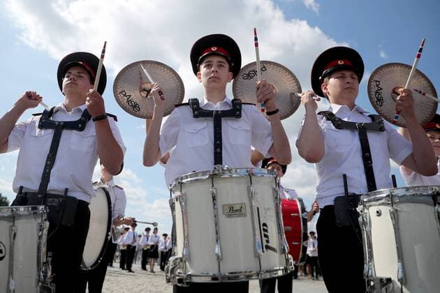 MOSCOW, RUSSIA - AUGUST 24, 2019: Massed band musicians of Moscow s secondary school No 1770 perform on the Poklonnaya Hill at the festival of children s wind bands as part of the 2019 Spasskaya Tower International Military Music Festival. Mikhail Tereshchenko TASS  TS0B7A18