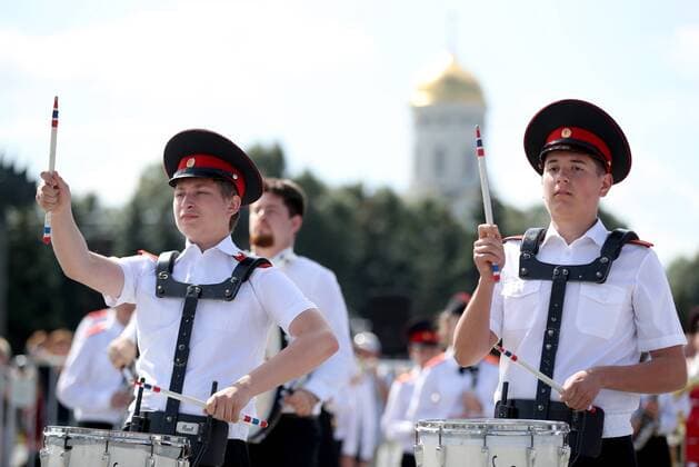 MOSCOW, RUSSIA - AUGUST 24, 2019: Massed band musicians of Moscow s secondary school No 1770 perform on the Poklonnaya Hill at the festival of children s wind bands as part of the 2019 Spasskaya Tower International Military Music Festival. Mikhail Tereshchenko TASS  TS0B7A19