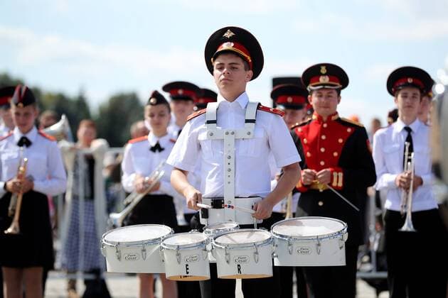 MOSCOW, RUSSIA - AUGUST 24, 2019: Massed band musicians of Moscow s secondary school No 1770 perform on the Poklonnaya Hill at the festival of children s wind bands as part of the 2019 Spasskaya Tower International Military Music Festival. Mikhail Tereshchenko TASS  TS0B7A1B