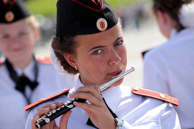 MOSCOW, RUSSIA - AUGUST 24, 2019: Massed band musicians of Moscow s secondary school No 1770 perform on the Poklonnaya Hill at the festival of children s wind bands as part of the 2019 Spasskaya Tower International Military Music Festival. Mikhail Tereshchenko TASS EDITORIAL USE ONLY; NO COMMERCIAL USE; NO ADVERTISING  TS0B7A14