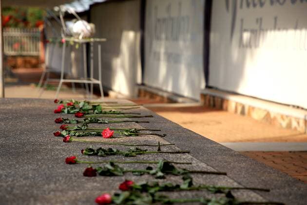 (190825) -- KIGALI, Aug. 25, 2019 -- Flowers are laid on the ground at the Kigali Genocide Memorial in Kigali, capital of Rwanda, on Aug. 13, 2019. In recent two decades, Rwanda has registered remarkable progress in unity and reconciliation among its people. As part of efforts to reconstruct the country and nurture a shared national identity, the Rwandan government drew on aspects of Rwandan culture and traditional practices to enrich its development programs. About 1 million people were killed in Rwanda during the 100-day genocide against the Tutsi in 1994. TO GO WITH Feature: Homegrown solutions help heal,develop nation after Rwandan genocide ) RWANDA-KIGALI-GENOCIDE-HOMEGROWN SOLUTIONS LyuxTianran 