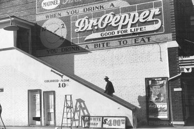 Man Ascending Stairs to Colored Entrance of Crescent Theater, Belzoni, Mississippi, USA, Marion Post Wolcott, Farm Security Administration, October 1939  Copyright: xCircaxImagesx ghi-circa04989