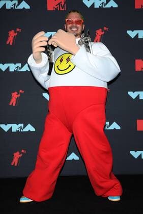 J Balvin wears a costume as he holds his award as he poses for photos in the press room during the 36th annual MTV Video Music Awards at the Prudential Center in Newark, NJ on Monday, August 26, 2019.  NJP20190826330 MONIKAxGRAFF