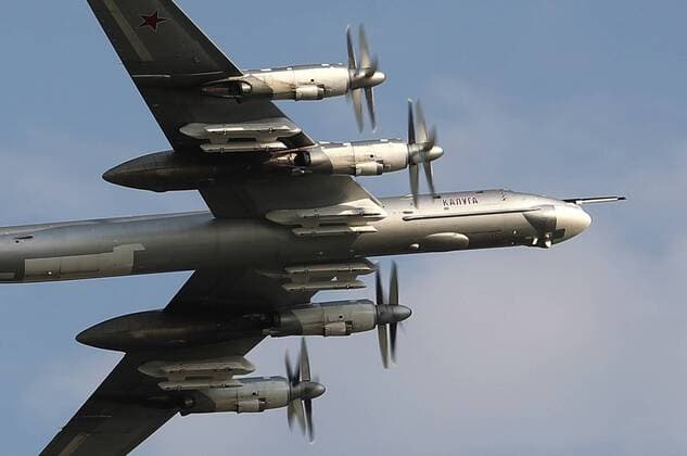 SARATOV REGION, RUSSIA - AUGUST 20, 2019: A Russian Air Force Tupolev Tu-95MS strategic bomber takes off from the Engels Airfield during a drill based on a scenario in which logistics units make the runway serviceable for Russian Air Force strategic bombers to take off following a drone attack and airstrike; the drill is taking place ahead of a broader logistical exercise by the Russian Armed Forces taking place across Russia s Central Military District. Anton Novoderezhkin TASS  TS0B8551