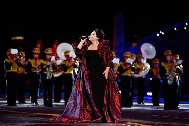 MOSCOW, RUSSIA - AUGUST 28, 2019: Opera singer Khibla Gerzmava (C) performs at a gala concert at the 2019 Spasskaya Tower Military Music Festival Festival and Tattoo in Red Square. Artyom Geodakyan TASS  TS0B8648