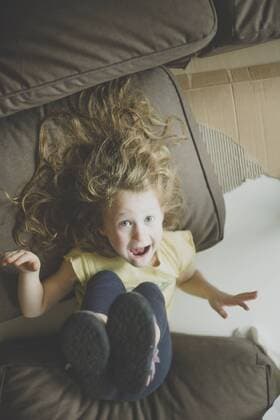 Portrait of little girl pulling funny faces model released Symbolfoto property released  IHF00164