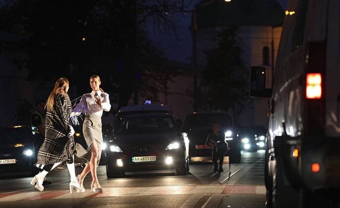 Models cross a road at a zebra crossing as they demonstrate creations by young fashion designers during the Safe Fashion performance at the Ukrainian Fashion Week SS20, Kyiv, capital of Ukraine, September 4, 2019. The performance showcased outfits by the finalists of the Safe Fashion Contest. Designers were to create collections of clothing and accessories with reflective elements to promote road safety. Ukrinform. Safe Fashion performance raises road safety awareness in Kyiv  Copyright: xDanilxShamkinx