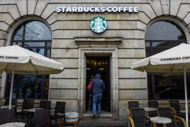 September 7, 2019, Wroclaw, Poland: A man seen entering inside Starbucks coffee shop at the old town..Wroclaw is the fourth biggest city in Poland and the largest city in the region of Silesia. Wroclaw or Breslau in German spent more than 200 years under German rule but after World War II the region was placed under Polish authority by the Potsdam Agreement under territorial changes requested by the Soviet Union. Wroclaw Poland - ZUMAs197 20190907_zab_s197_101 Copyright: xOmarxMarquesx