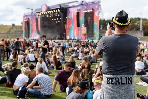 Visitors in front of the North Stage at the music festival Lollapalooza at the Berlin Olympic Stadium snapshot photography F Boillot