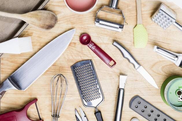 View from above kitchen utensils on wooden surface - knolling  Copyright: PeterxStark fStopImages1835002