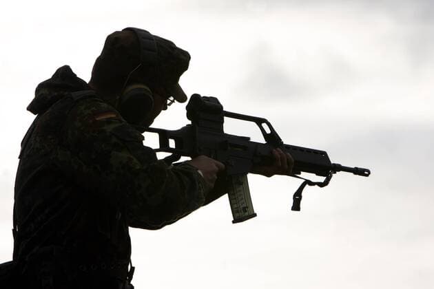 Brandenburg, Germany Shooting training with the Bundeswehr 06 11 2006, Strausberg, Brandenburg, Germany, DEU Shooting training as part of the basic training with the Bundeswehr Shooting training at a shooting range in Brandenburg Silhouette of a recruit who shoots with his assault rifle G 36 standing Strausberg Brandenburg Germany
