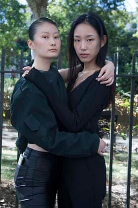 Street Style on day three of London Fashion Week SS 2020 on Saturday September 14th 2019, showcasing stylish individuals London is internationally known for. Image shows two fresh face new gen models from Body London, on their first engagement placings at LFW. On the left is Lim and her friend on the right is Hwa Yeong Kim.  (112123826)