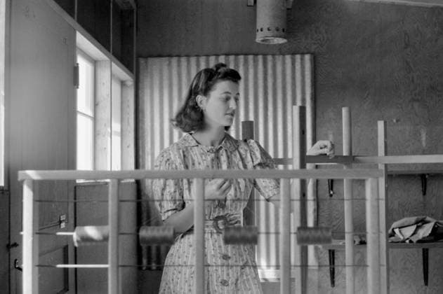 Woman Working in Weaving Shop, Farm Security Administration (FSA) Camp, Sinton, Texas, USA, Arthur Rothstein for Farm Security Administration (FSA), February 1942 Editorial Use Only  Copyright: CircaxImages ghi-circa01735