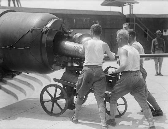 U.S. Military Training during World War I, Soldiers Loading Ammunition into Large Cannon, Harris & Ewing, 1917  Copyright: CircaxImages ghi-circa03562