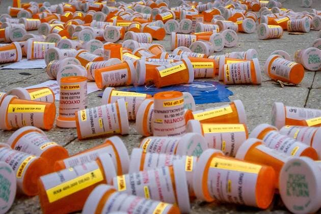 September 12, 2019, New York, USA: Members of P.A.I.N. (Prescription Addiction Intervention Now) and Truth Pharm staged a protest on September 12, 2019 outside Purdue Pharma headquarters in Stamford, over their recent controversial opioid settlement. Participants dropped hundreds prescription bottles of OxyContin while holding tombstones with the names of opioids casualties and banners reading Shame on Sackler and 200 Dead Each Day USA - ZUMAm432 20190912_znp_m432_004 Copyright: xErikxMcGregorx