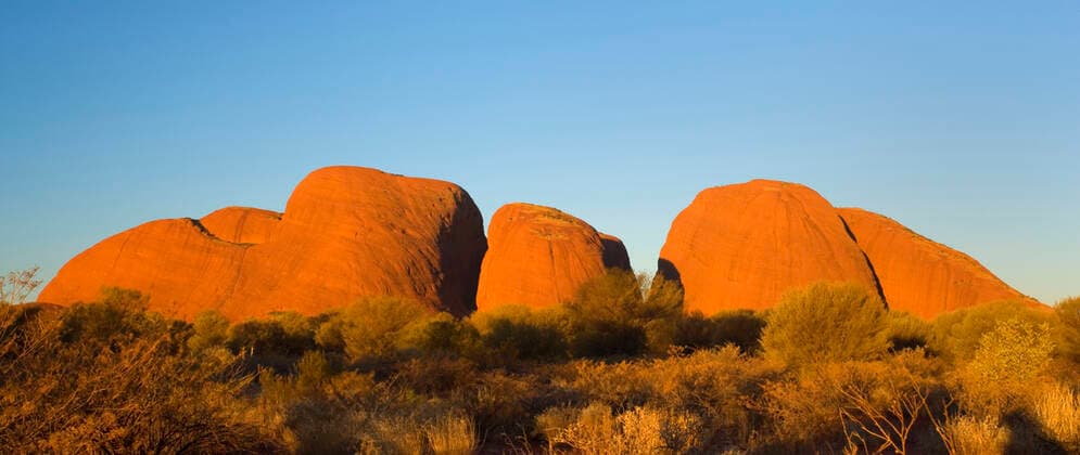 IMAGO Nature: Unsere Erde, Naturschutz, Naturschutzgebiete in Ozeanien Olgas - Kata Tjuta - famous sandstone rocks just before sunset . Uluru-Kata Tjuta National Park, World Heritage Area, Northern Territory, Australia. Aboriginals of the Anangu tribe call The Olgas Kata Tjuta. Uluru-Kata Tjuta is listed as a World Heritage Area for both their cultural and natural values. Caution: please use images of Uluru; Kata Tjuta (Olgas) and Kakadu National Park Only for editorial purposes. No use in advertisment sector is allowed without further consultation. Exclusive: Not available for advertising.  Copyright: Steffenx&xAlexandraxSailer 10758752