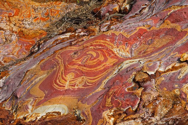 IMAGO Nature: Unsere Erde, Ressourcen, Erze Sandstone - pink with oxydation & minerals including Iron & Manganese. Flores Island - Indonesia.  Copyright: M.xWatson 10782279