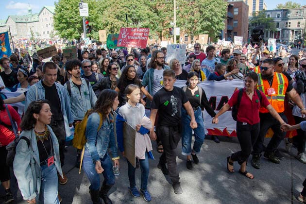 September 27, 2019 - Montreal, Quebec, Canada - Swedish climate activist GRETA THUNBERG joins the climate strike protest in Montreal marching along with young activists and their supporters. Hundreds of thousands of people marched along the streets of Downtown Montreal Friday afternoon demanding real action on climate change. Montreal Canada - ZUMAm182 20190927_int_m182_002 Copyright: xCristianxMijeax