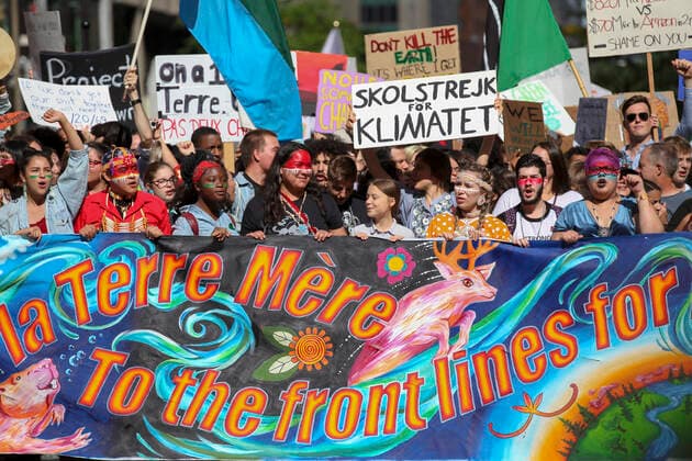 September 27, 2019 - Montreal, Quebec, Canada - Swedish climate activist GRETA THUNBERG joins the climate strike protest in Montreal marching along with young activists and their supporters. Hundreds of thousands of people marched along the streets of Downtown Montreal Friday afternoon demanding real action on climate change. Montreal Canada - ZUMAm182 20190927_int_m182_008 Copyright: xCristianxMijeax
