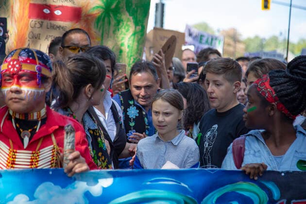 September 27, 2019 - Montreal, Quebec, Canada - Swedish climate activist GRETA THUNBERG joins the climate strike protest in Montreal marching along with young activists and their supporters. Hundreds of thousands of people marched along the streets of Downtown Montreal Friday afternoon demanding real action on climate change. Montreal Canada - ZUMAm182 20190927_int_m182_009 Copyright: xCristianxMijeax