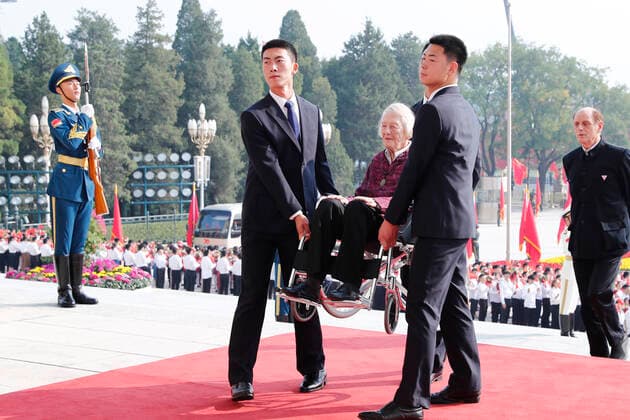 (190929) -- BEIJING, Sept. 29, 2019 -- Awardee of the Friendship Medal Isabel Crook arrives at the Great Hall of the People in Beijing, capital of China, Sept. 29, 2019. China held the presentation ceremony of the national medals and honorary titles on Sunday at the Great Hall of the People, ahead of the 70th anniversary of the founding of the People s Republic of China (PRC) on Oct. 1. ) CHINA-BEIJING-NATIONAL MEDALS-HONORARY TITLES-PRC FOUNDING-70TH ANNIVERSARY (CN) LiuxBin 