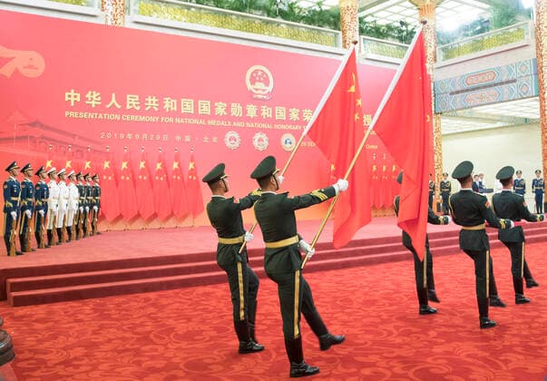 (190929) -- BEIJING, Sept. 29, 2019 -- Guards of honor escort the Medal of the Republic, the Friendship Medal and the Medal for recipients of national honorary titles during the presentation ceremony in the Great Hall of the People in Beijing, capital of China, Sept. 29, 2019. China held the presentation ceremony for national medals and national honorary titles on Sunday at the Great Hall of the People, ahead of the 70th anniversary of the founding of the People s Republic of China (PRC) on Oct. 1. ) CHINA-BEIJING-NATIONAL MEDALS-HONORARY TITLES-PRC FOUNDING-70TH ANNIVERSARY (CN) WangxYe 