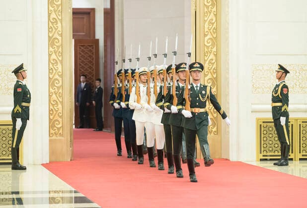 (190929) -- BEIJING, Sept. 29, 2019 -- Guards of honor enter the venue of the presentation ceremony at the Great Hall of the People in Beijing, capital of China, Sept. 29, 2019. China held the presentation ceremony for national medals and national honorary titles on Sunday at the Great Hall of the People, ahead of the 70th anniversary of the founding of the People s Republic of China (PRC) on Oct. 1. ) CHINA-BEIJING-NATIONAL MEDALS-HONORARY TITLES-PRC FOUNDING-70TH ANNIVERSARY (CN) WangxYe 