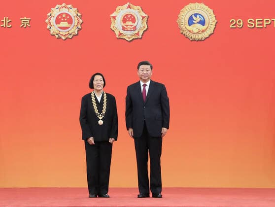 (190929) -- BEIJING, Sept. 29, 2019 -- Chinese President Xi Jinping, also general secretary of the Communist Party of China Central Committee and chairman of the Central Military Commission, presents the Medal of the Republic to Shen Jilan at the presentation ceremony of the national medals and honorary titles of the People s Republic of China at the Great Hall of the People in Beijing, capital of China, Sept. 29, 2019. ) CHINA-BEIJING-NATIONAL MEDALS AND HONORARY TITLES-PRESENTATION CEREMONY (CN) WangxYe 