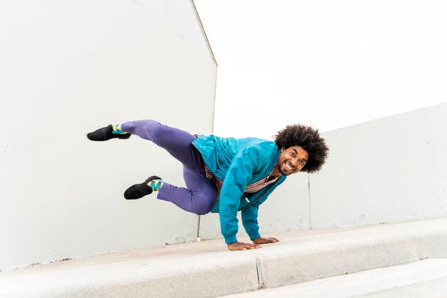 Young hipster man dancing, white wall in the background model released Symbolfoto  AFVF03827