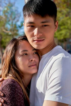 Happy young couple hugging outdoors model released Symbolfoto  GEMF03074